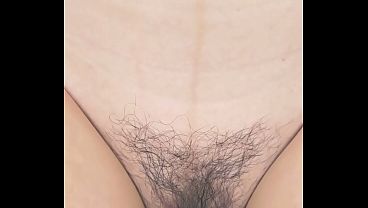 Nuri Mitta sits against the wall and fingers her twat before toying it